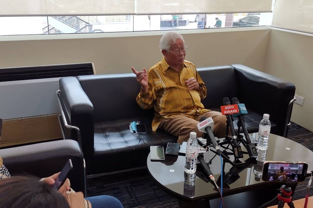 Manyin speaks at the press conference.  —  Borneo Post Online pic