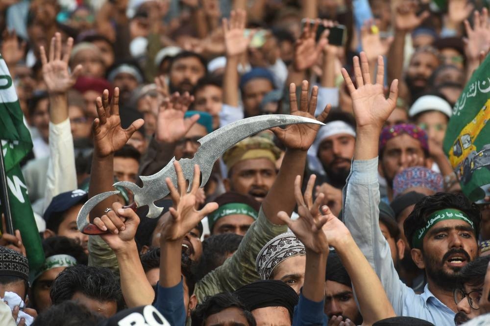 Demonstrators shout anti-Indian slogans during a protest against the India’s Bharatiya Janata Party former spokeswoman Nupur Sharma over her remarks on the Prophet Mohammed, in Karachi on June 10, 2022. — AFP pic
