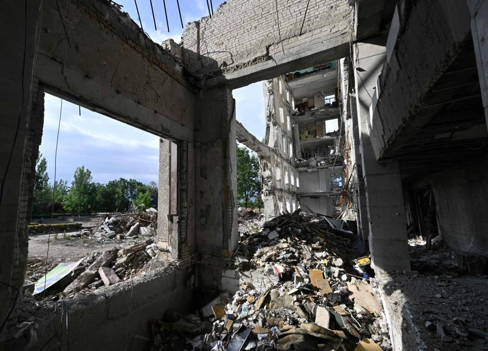 This photograph taken on June 10, 2022, shows the regional government building destroyed by a Russian missile strike in March 2022, in the southern Ukrainian city of Mykolaiv, amid the Russian invasion of Ukraine. — AFP pic