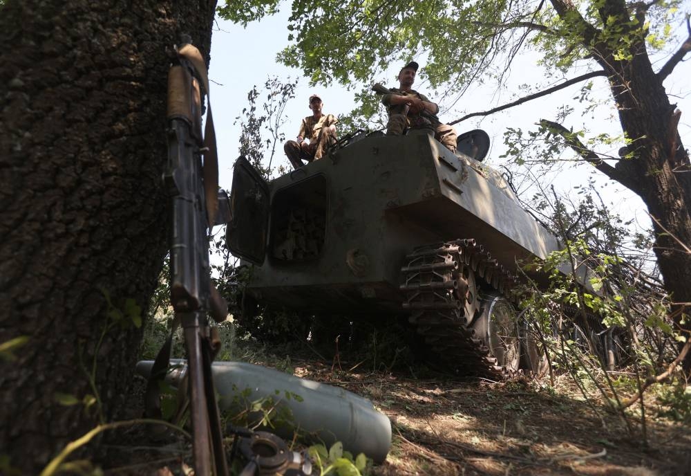 Ukrainian artillerymen attend at the front line near the city of Soledar, Donetsk region, on June 10, 2022. — AFP pic