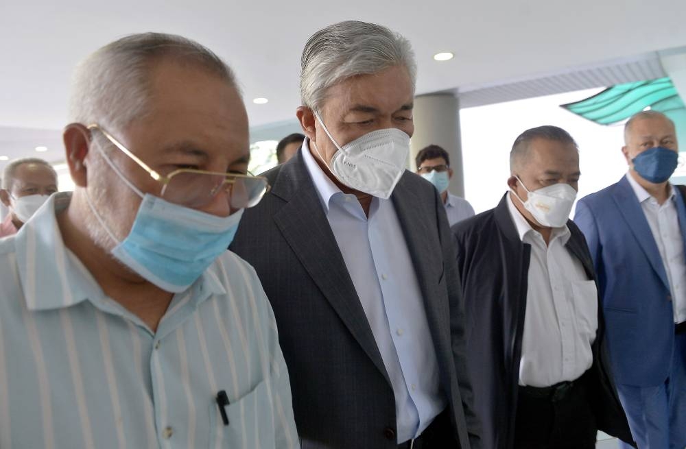 File picture shows former Deputy Prime Minister Datuk Seri Dr Ahmad Zahid Hamidi (second, left) appearing at the Shah Alam High Court June 9, 2022, for the trial of a corruption case he faced in relation to the Overseas Visa System (VLN). — Bernama pic