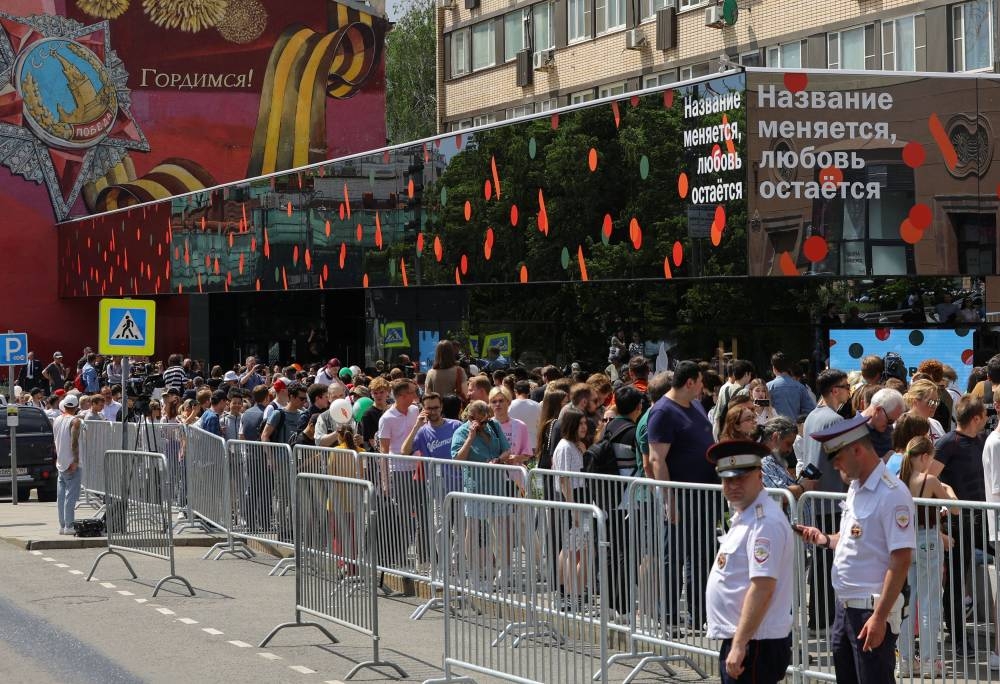 People gather near the new 'Vkusno & tochka' restaurant, which opens after McDonald's Corp exits the Russian market, in Moscow June 12, 2022. - Reuters pic