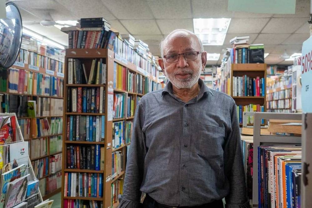 Mohamad Ismail, owner of Knowledge Book Centre, posing for a photo June 7, 2022. — TODAY pic
