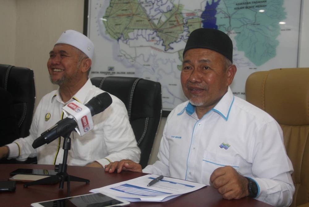Environment and Water Minister Datuk Seri Tuan Ibrahim Tuan Man (right) speaks during a press conference in Bagan Serai June 14, 2022.  