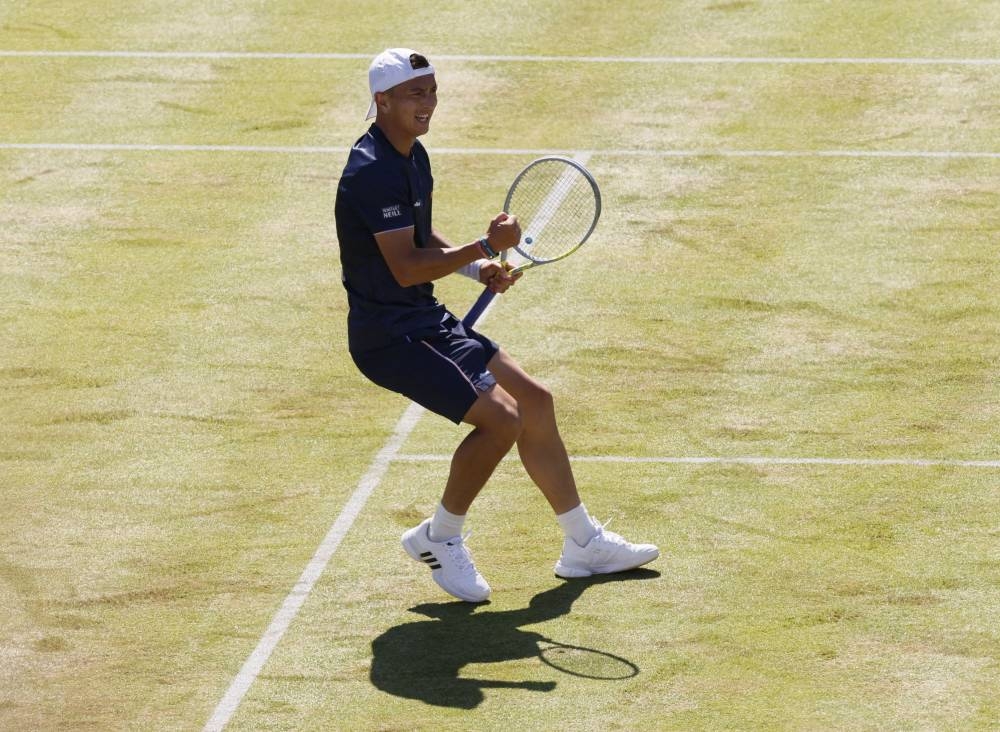 Britain's Ryan Peniston celebrates winning his second round match against Norway's Casper at Queen's Club, London June 14, 2022. — Reuters pic 