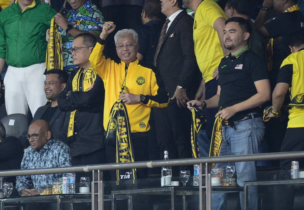 Datuk Seri Ismail Sabri Yaakob is seen cheering on Harimau Malaya during their match against Bangladesh at the National Stadium in Bukit Jalil June 14, 2022. — Bernama pic