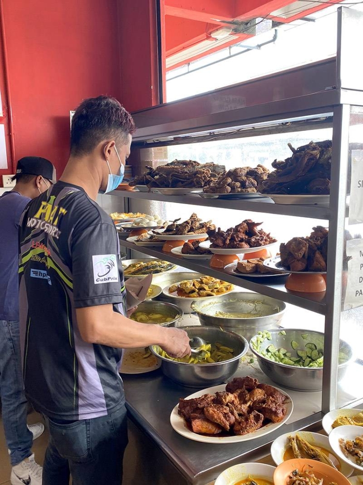 Queue up and they will serve your food once you decide what you want to eat.