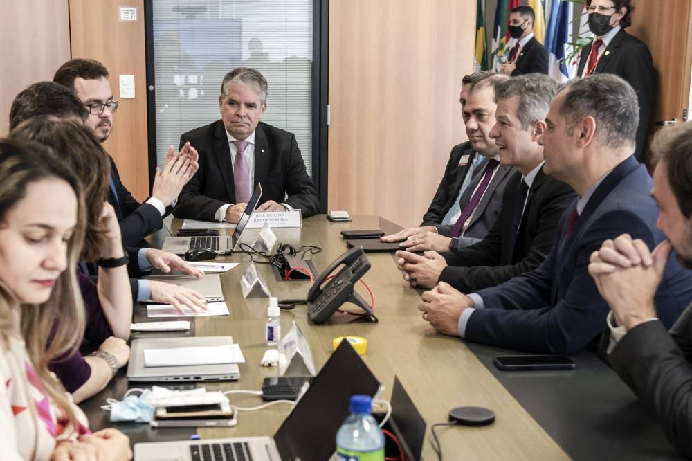 A handout picture released by the Federal Public Ministry (MPT) shows Labour Attorney General Jose Ramos Pereira (centre) and representatives of German carmaker Volkswagen of Brazil (right) during a hearing at the the Federal Public Ministry building in Brasilia June 14, 2022. — Picture by Brazil's Federal Public Ministry via AFP