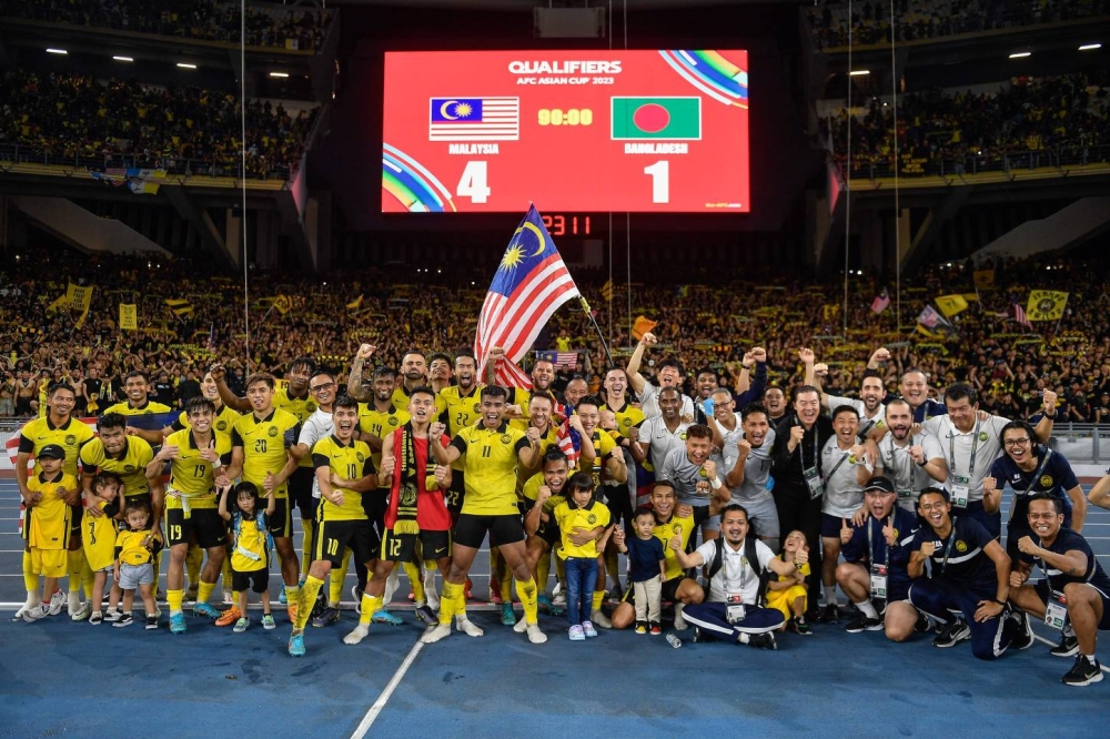Harimau Malaya squad celebrate after beating Bangladesh at the National Stadium in Bukit Jalil June 14, 2022. — Bernama pic