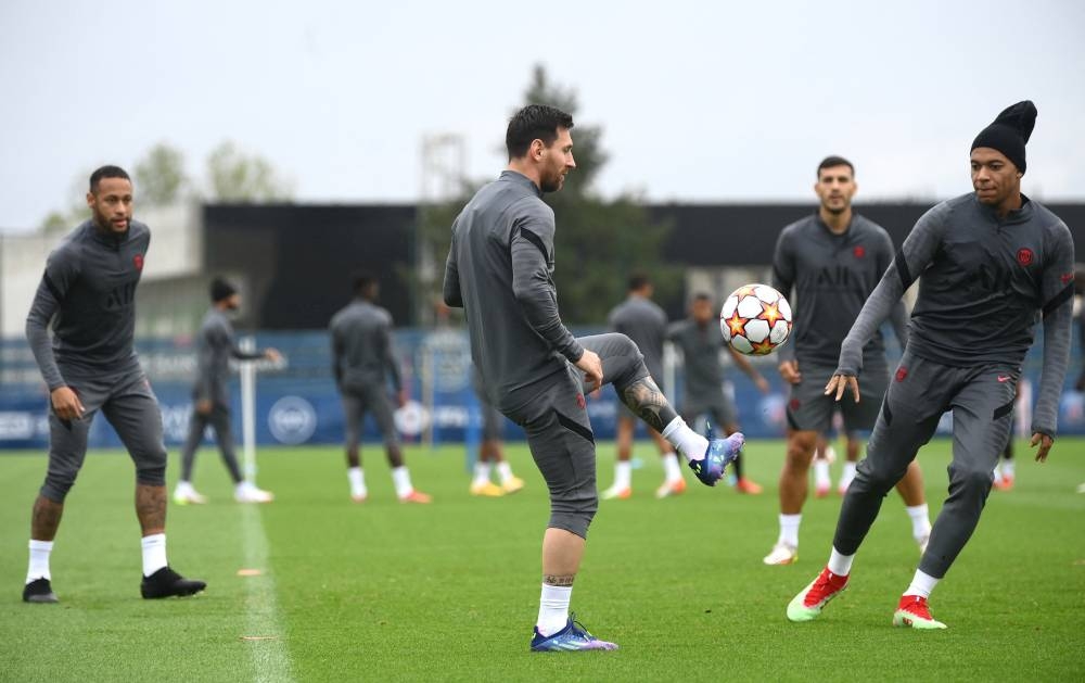 File picture of Paris Saint-Germain’s Lionel Messi, Neymar and Kylian Mbappe taking part during a training session at the club’s Camp des Loges training ground in Saint-Germain-en-Laye, September 27, 2021. — AFP pic