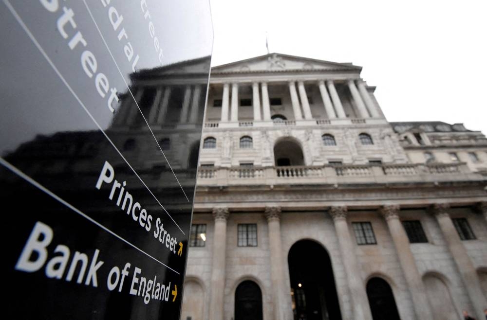 The Bank of England (BoE) building is reflected in a sign, London, Britain December 16, 2021. ― Reuters file pic