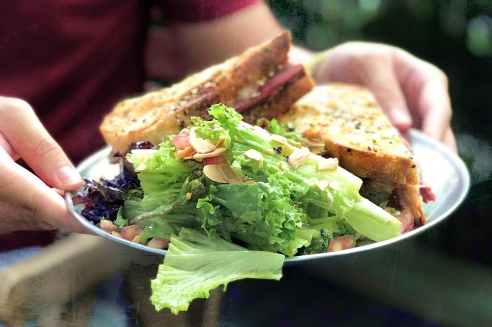 Sandwiches at Superfine come with a hearty salad on the side.