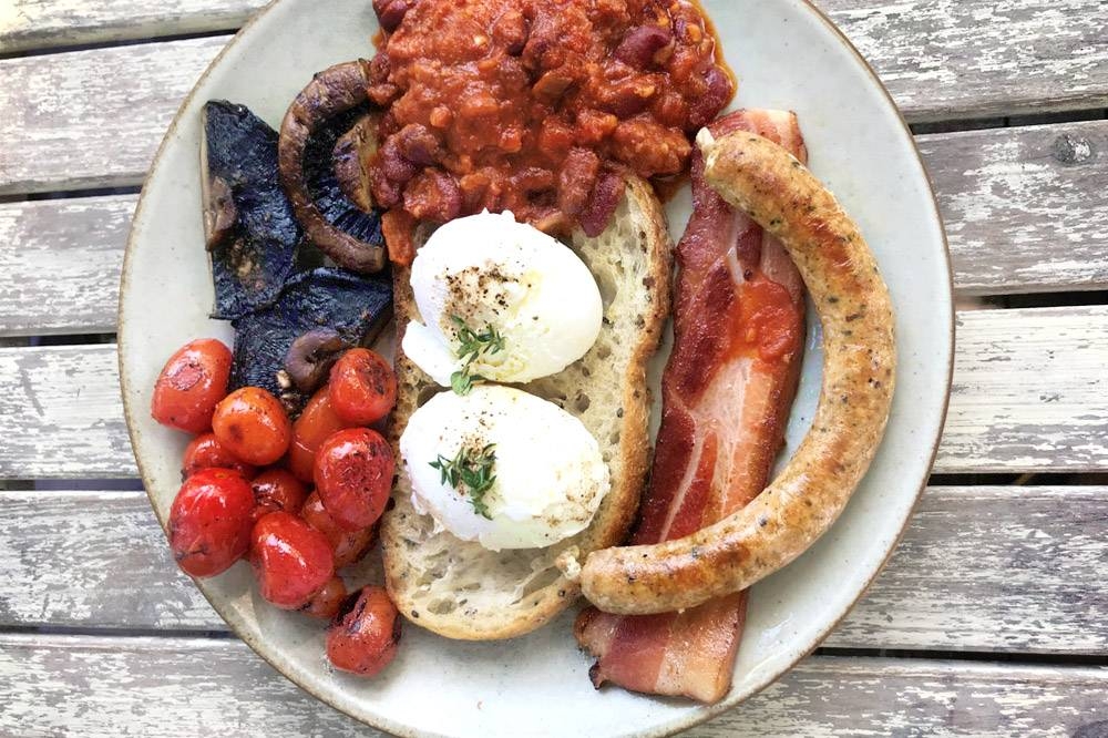 The Full Breakfast with 'kampung' eggs, chipolata sausage, streaky bacon and chorizo beans.