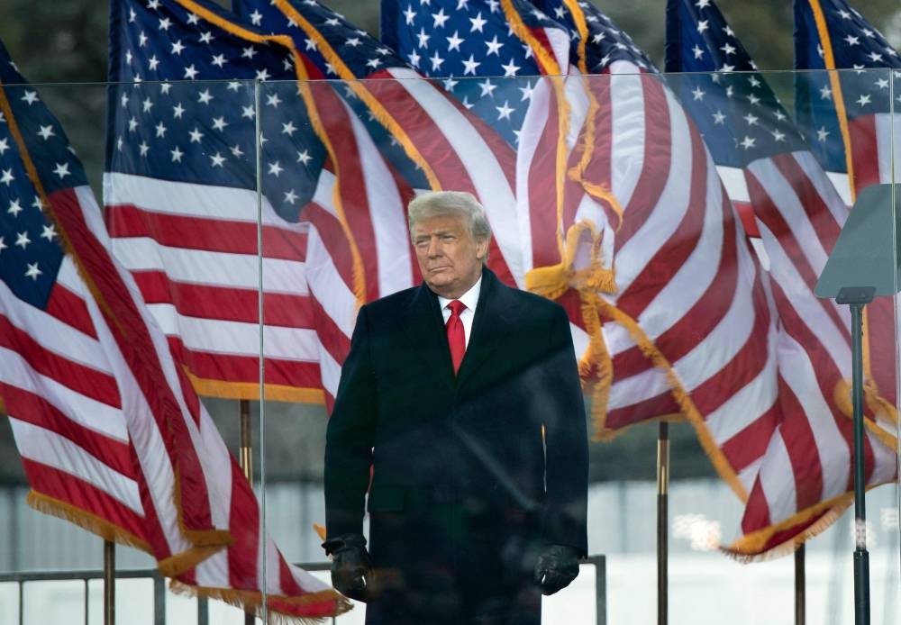 In this file photo taken on January 6, 2021 US President Donald Trump arrives to speak to supporters from The Ellipse near the White House in Washington, DC. — AFP pic