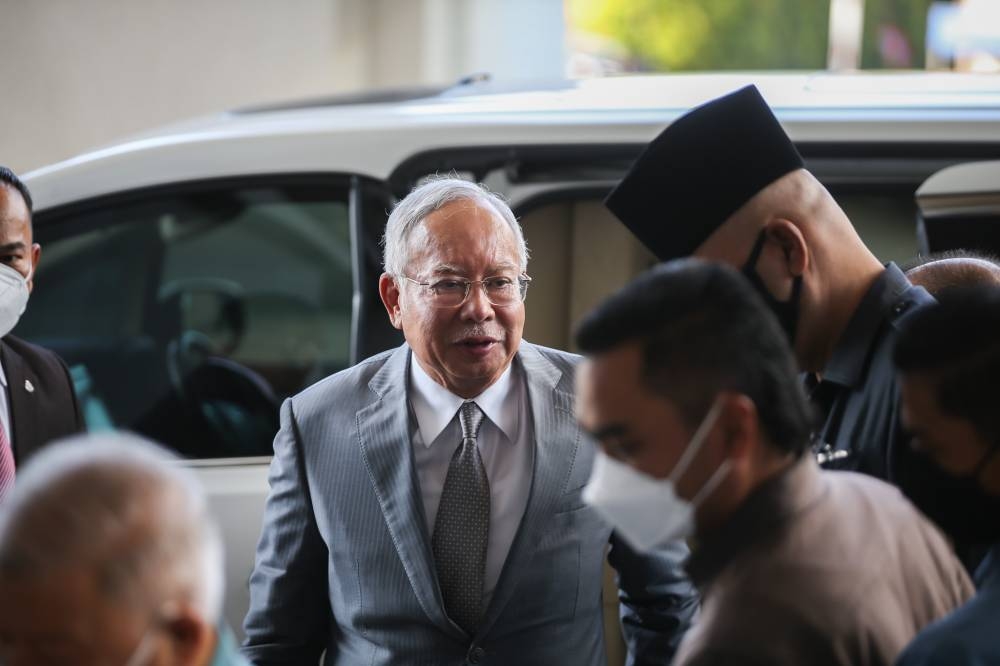 Datuk Seri Najib Razak arrives at the Kuala Lumpur High Court June 15, 2022. — Picture by Ahmad Zamzahuri