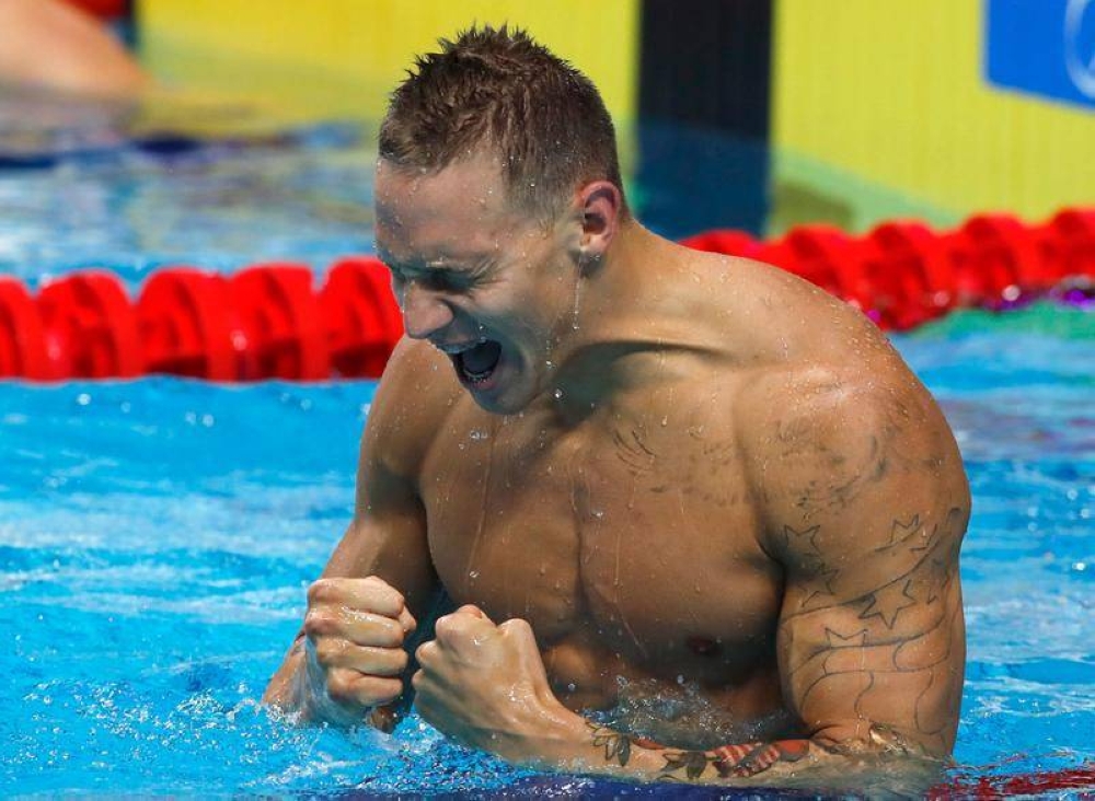 Caeleb Remel Dressel of the US reacts after winning the Fina world championships men's 100m butterfly final in Budapest in this file picture taken on July 29, 2017. — Reuters pic