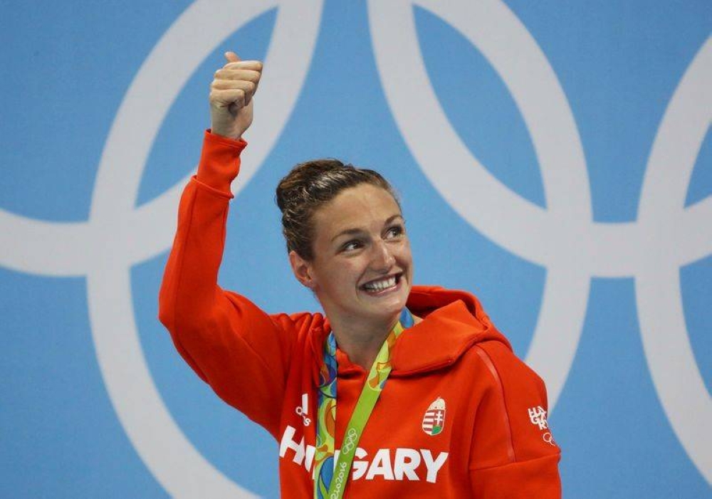 Katinka Hosszu of Hungary celebrates her gold medal on the podium after winning the Olympic women's 400m individual medley swimming final at the Olympic Aquatics Stadium, Rio de Janeiro in this file photo taken on August 6, 2016. — Reuters pic