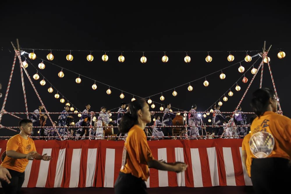 Participants clad in traditional Japanese dance on the stage during Bon Odori Festival in Shah Alam July 21, 2018. ― File picture by Azneal Ishak