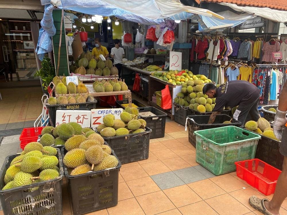 Durians being sold at fruit stall Hong Heng Fruit Trading in Toa Payoh on June 17, 2022. — TODAY pic