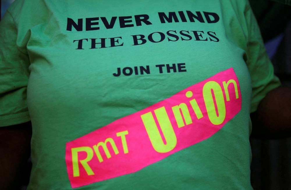 A member of the Rail, Maritime and Transport Union pickets at Victoria Station in London, Britain August 9, 2016. ― Reuters pic