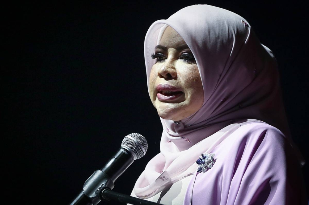 Women Development, Family And Community Minister Datuk Seri Rina Harun delivers her speech during the 2020 National Women's Day celebration at the Kuala Lumpur Convention Centre March 8, 2022. — Picture by Yusof Mat Isa