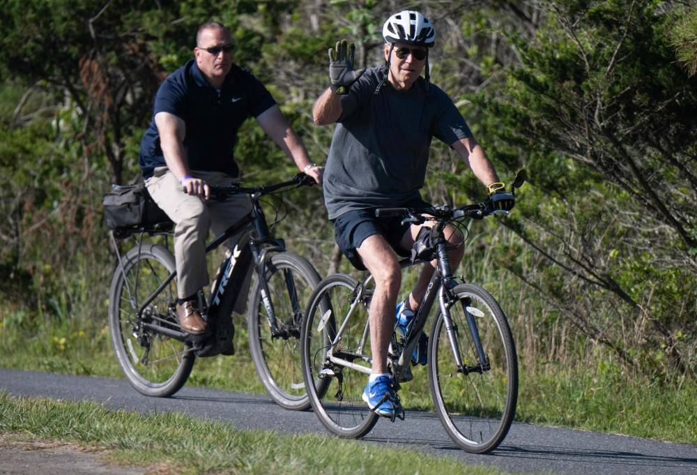 Biden falls from bike but is unhurt