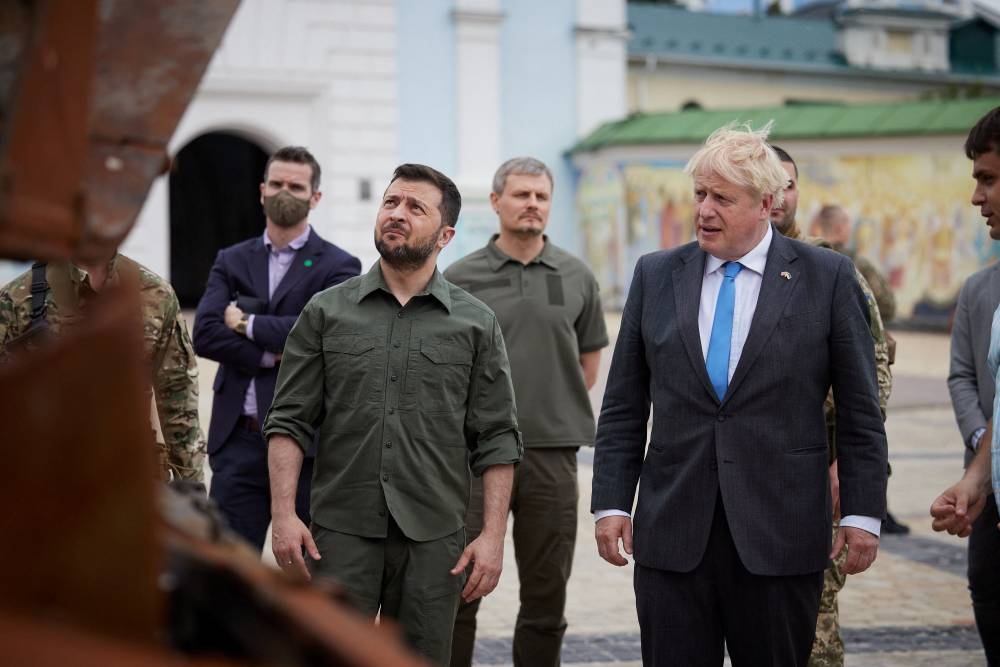 British Prime Minister Boris Johnson and Ukraine’s President Volodymyr Zelenskiy visit an exhibition of destroyed Russian military vehicles and weapons, as Russia’s attack on Ukraine continues, at Mykhailivska Square in Kyiv, Ukraine June 17, 2022. ― Reuters pic