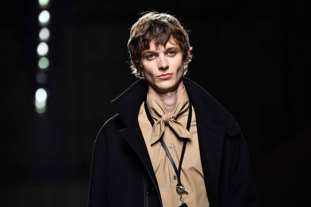 In this file photo taken on January 18, 2020 A model presents a creation by Hermes, during men's Fashion Week for the Fall/Winter 2020/21 collection in Paris. The first Fashion Week without any Covid restrictions, the men's ready-to-wear week is back in force in Paris with the very symbolic return to the calendar of Celine by Hedi Slimane. — AFP pic