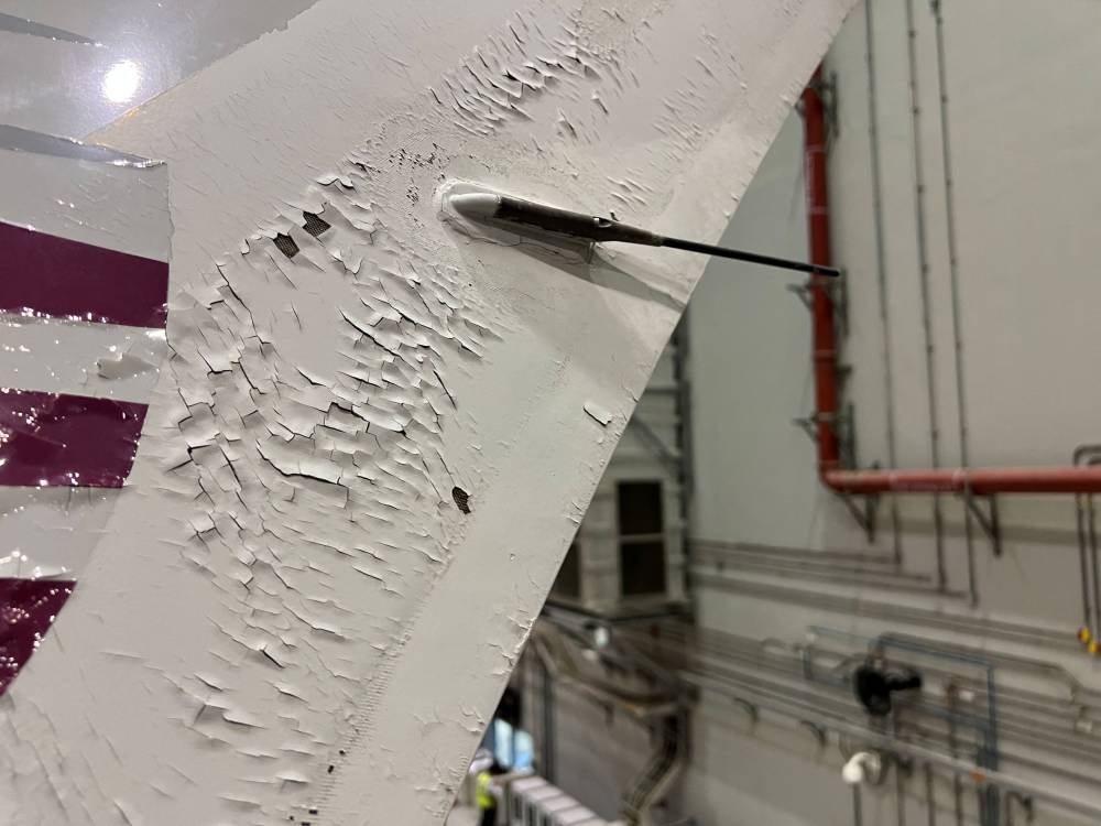Surface damage seen on Qatar Airways' airbus A350 parked at Qatar airways aircraft maintenance hangar in Doha June 20, 2022. — Reuters pic