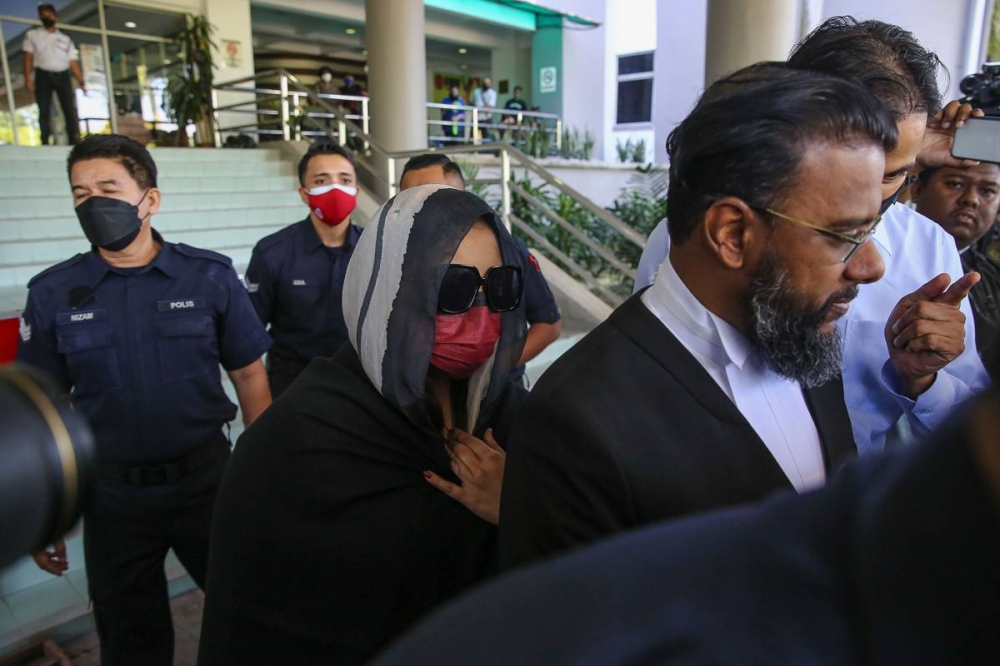 Samirah Muzaffar leaves the Shah Alam High Court June 21, 2022. — Picture by Yusof Mat Isa