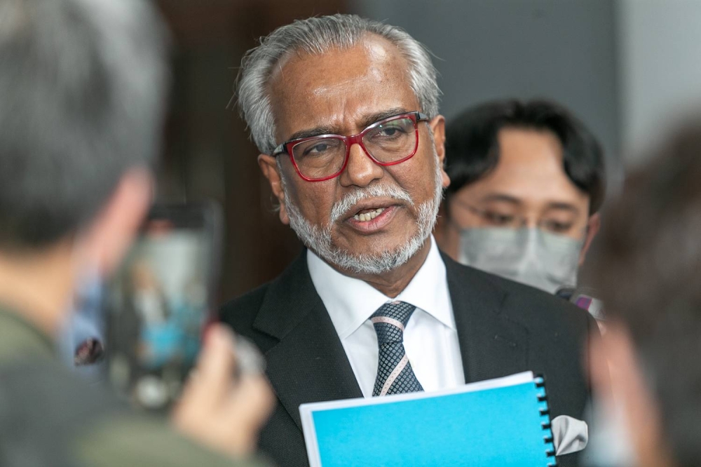 Tan Sri Mohamed Shafee bin Mohamed Abdullah speaks to the media at the Kuala Lumpur High Court June 7, 2022 ― Picture by Devan Manuel