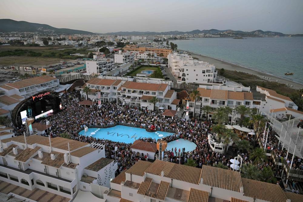 File photo of people partying at the Pacha Ibiza nightclub in Ibiza, on June 16, 2022. — ETX Studio pic