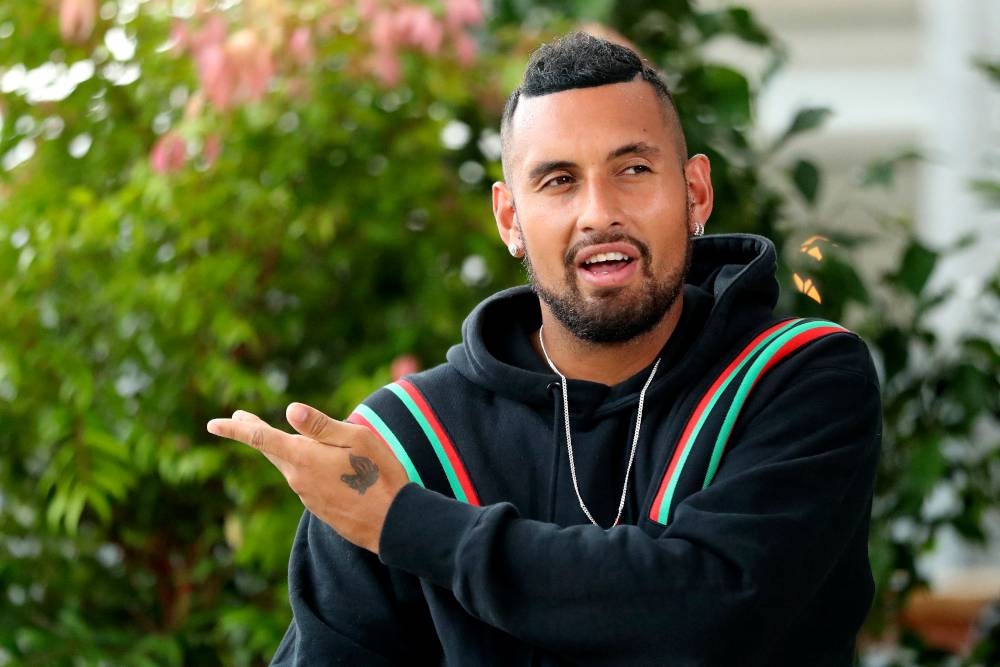 Nick Kyrgios would rather wear all black when competing at Wimbledon instead of adhering to the all-white dress code. — AFP pic