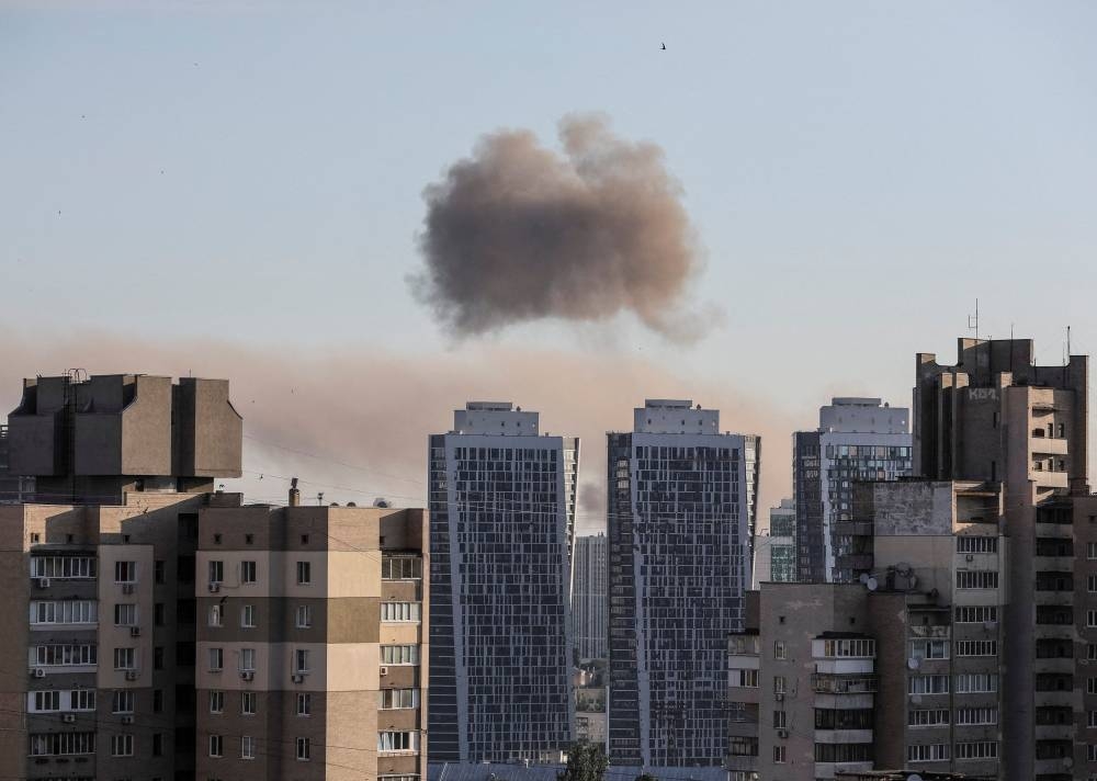 Smoke rises after a missile strike in Kyiv, Ukraine, June 26, 2022. — Reuters pic