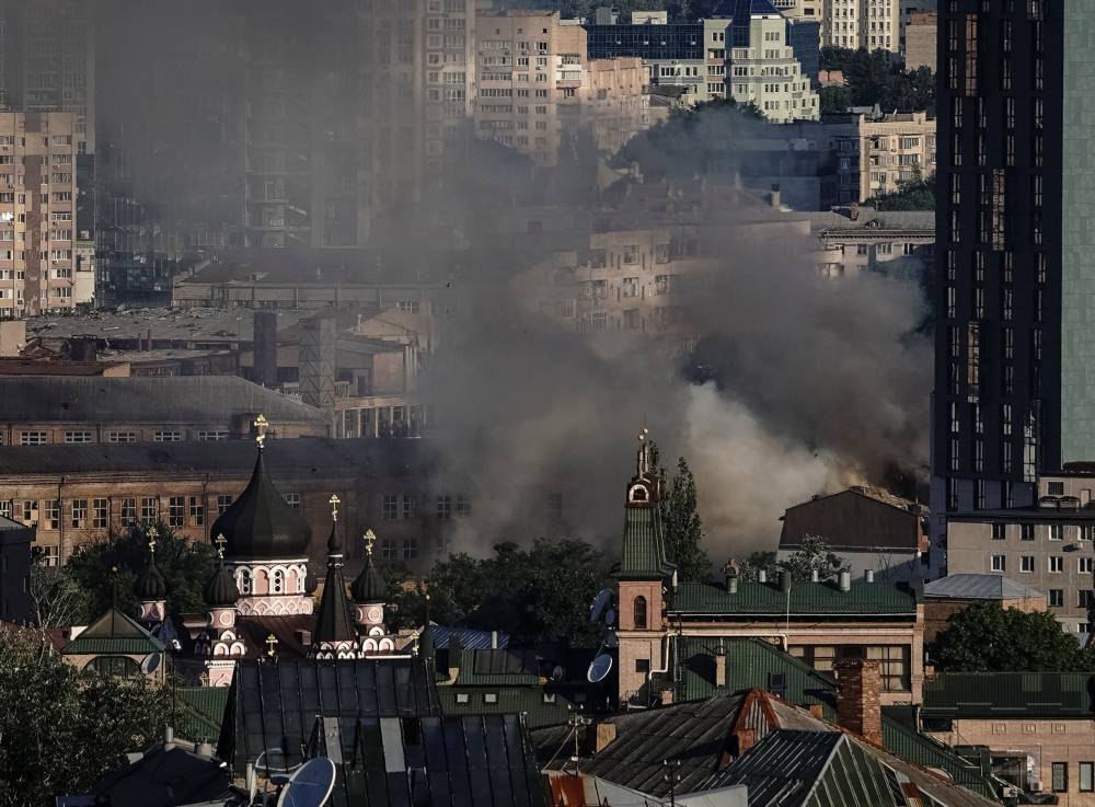 Smoke rises after a missile strike, as Russia's attack on Ukraine continues, in Kyiv, Ukraine June 26, 2022. — Reuters pic