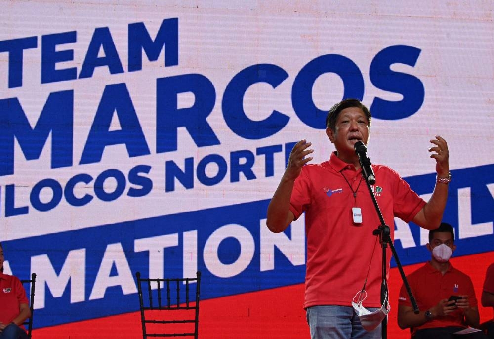 This photo taken on March 25, 2022 shows Philippine presidential candidate Ferdinand ‘Bongbong’ Marcos Jr, the son of late dictator Ferdinand Marcos, speaking to supporters during a campaign rally in Laoag City, Ilocos norte province. — AFP pic