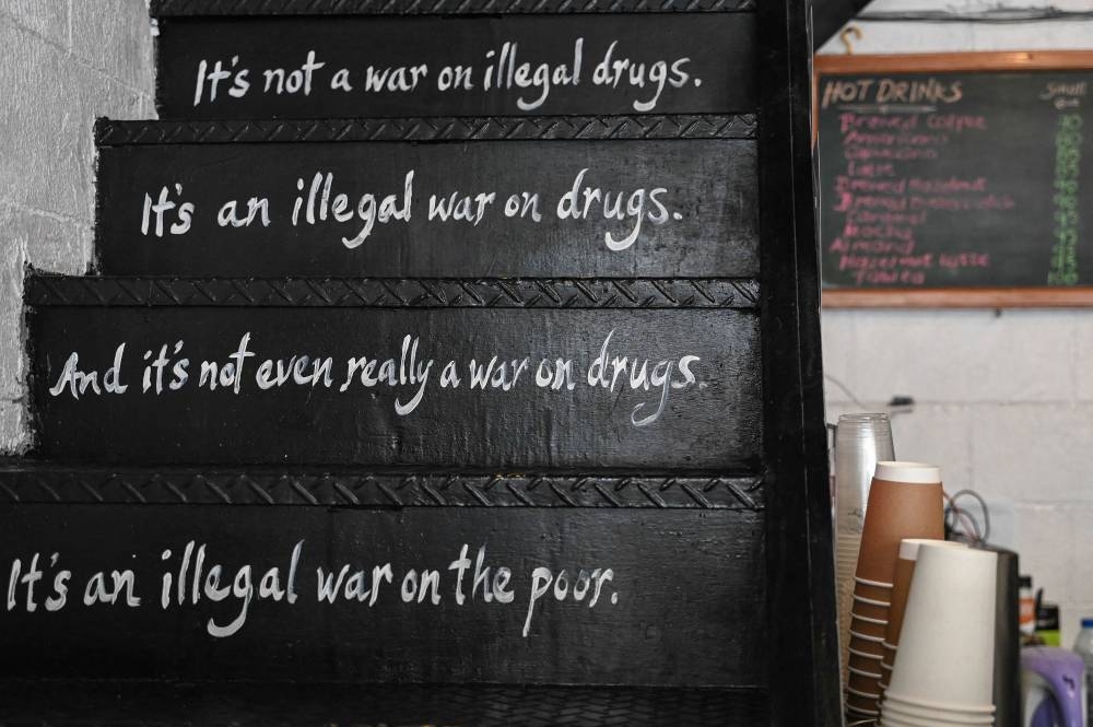 This photo taken on June 2, 2022 shows a display at the Silingan Cafe, a coffee shop devoted to remembering victims of the government's drug war, in Quezon City, suburban Manila. — AFP pic