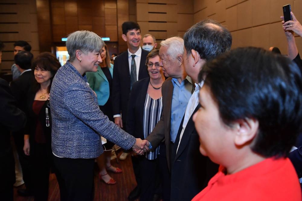 Australia’s Foreign Minister Senator Penny Wong (left) greets members of the public during a networking brunch with government, business and civil societies in Kuala Lumpur June 29, 2022. ― Bernama pic