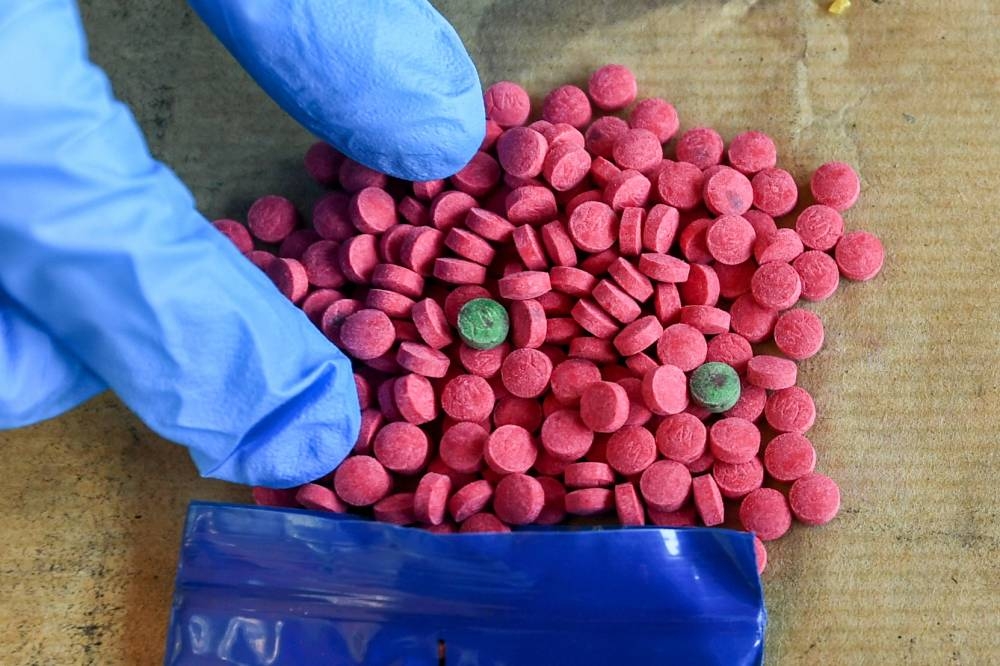 Some of the 252,000 yaba pills worth RM2.5 million seized by Kelantan police in two separate raids in Kota Baru and Bachok, June 29, 2022. — Bernama pic 