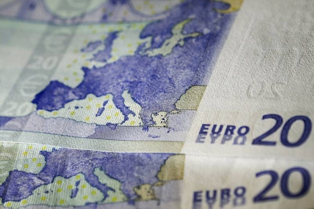 The euro trimmed those losses, flattening on the day, after data showed Spanish 12-month inflation had risen to 10.2 per cent in June. — Reuters pic 