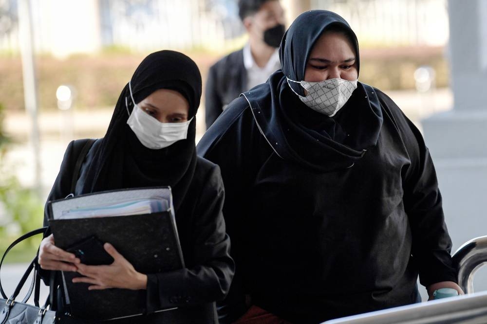Rumah Bonda founder Siti Bainun Ahd Razali (right) at the Kuala Lumpur Court Complex, June 29, 2022. — Bernama pic 