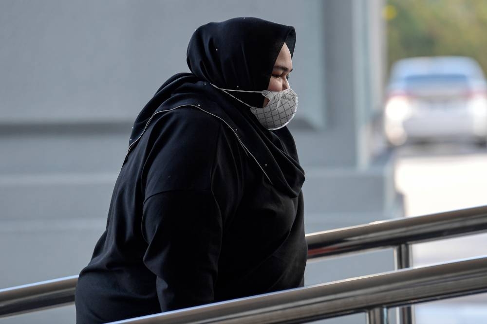 Rumah Bonda founder Siti Bainun Ahd Razali, 30, faces two charges of neglecting and abusing the 13-year-old girl, causing the victim to suffer physical and emotional injuries. — Bernama pic 