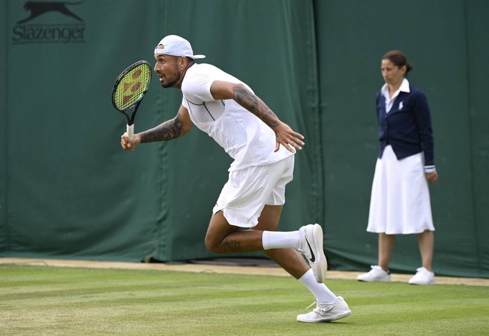 Australia’s Nick Kyrgios in action during his second round match against Serbia’s Filip Krajinovic in London, June 30, 2022. — Reuters pic 