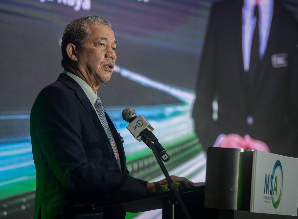 Senior Works Minister Datuk Seri Fadillah Yusof delivers a speech at the Inauguration Ceremony of the Highway Digital Network Project and the Signing Ceremony of the MSA Resources Sdn Bhd Strategic Partner Memorandum of Understanding in Kuala Lumpur, June 30, 2022. — Bernama pic 