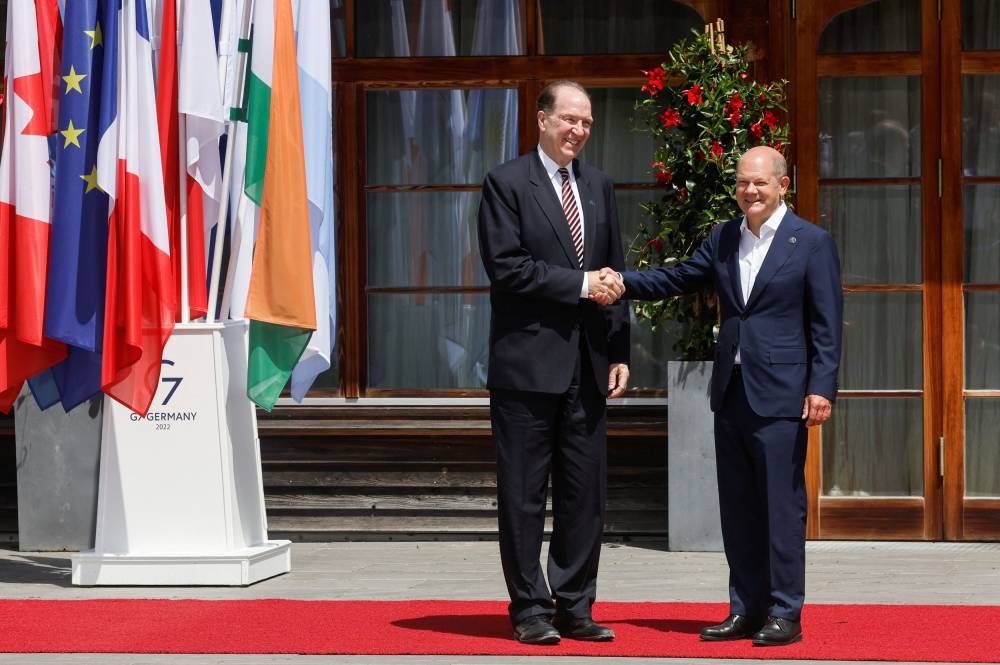 German Chancellor Olaf Scholz welcomes World Bank Group President David Malpass (left), at the Bavarian resort of Schloss Elmau Castle in Germany June 27, 2022. — Reuters pic