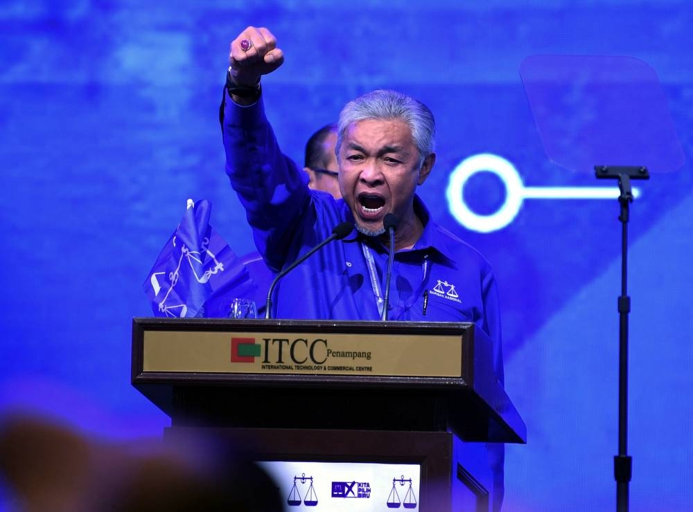 Umno President and Barisan Nasional (BN) Chairman Datuk Seri Dr Ahmad Zahid Hamidi delivering a speech at the Barisan Nasional Convention at ITCC Penampang, July 2, 2022. — Bernama pic