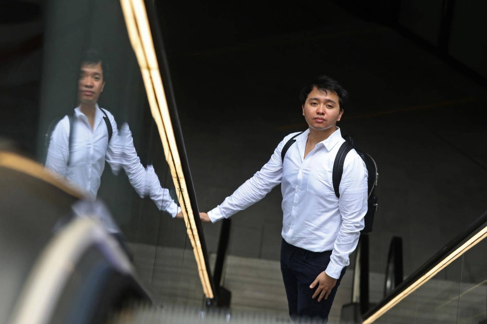 Mr Frederick Chng, a second-year business analytics student from the Singapore University of Social Sciences, co-founded Rhine Digital, a social discovery platform that connects people with businesses and attractions. — TODAY pic