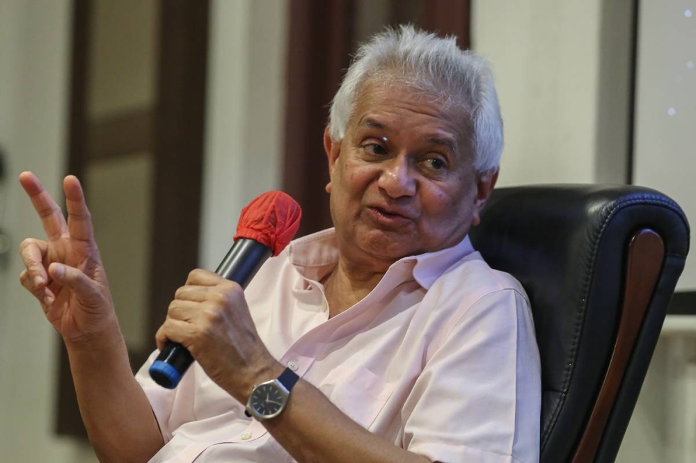 Former attorney general Tommy Thomas speaks during the meet and greet session at the Kuala Lumpur and Selangor Chinese Assembly Hall in Kuala Lumpur July 3, 2022. — Picture by Yusof Mat Isa