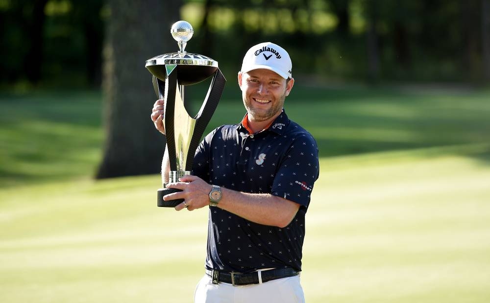 Branden Grace of South Africa poses with the the trophy after winning the Portland LIV Golf Invitational at the Pumpkin Ridge Golf Club on July 2, 2022. — AFP pic