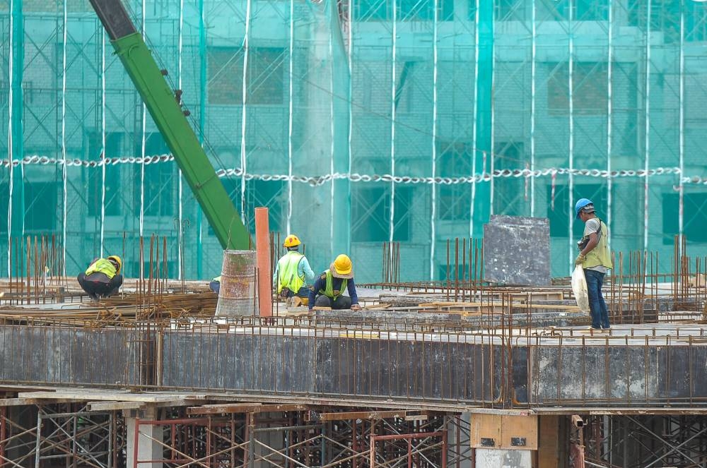 To ensure that projects are delivered on time, property developers might delay some of their new launches to avoid potential LAD payment in view of labour shortages, said Maybank IB. — Picture by Shafwan Zaidon